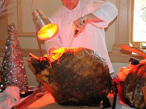 Rotisserie Whole Steamship of Beef. Flame Show Cooking Catering or Drop Off Catering